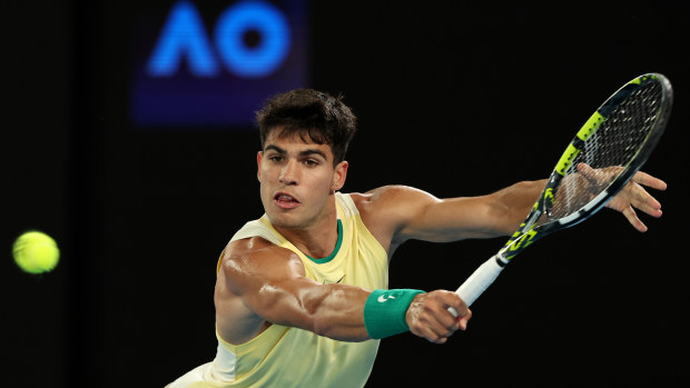 Carlos Alcaraz of Spain plays a backhand in their first round match against Richard Gasquet of France during the 2024 Australian Open at Melbourne Park on January 16, 2024 in Melbourne, Australia. (Photo by Darrian Traynor/Getty Images)