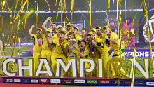 Australia players celebrate with the trophy after Australia won the ICC Men's Cricket World Cup final match against India in Ahmedabad, India, Sunday, Nov. 19, 2023. (AP Photo/Rafiq Maqbool)