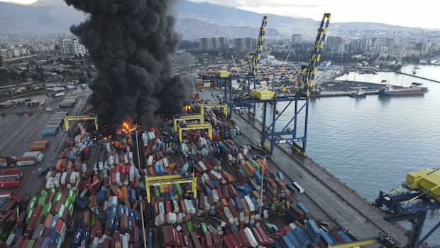 Smoke rises from burning containers at the port in the earthquake-stricken town of Iskenderun, southern Turkey.