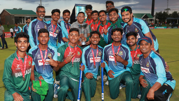 The Bangladesh team poses with their U19 World Cup winners medals.
