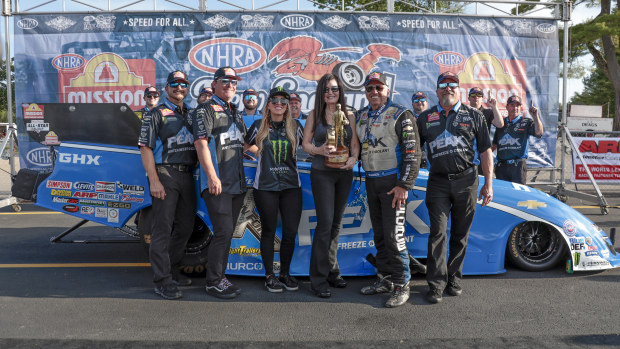 Funny Car winner John Force, of Yorba Linda, CA, driving a JFR 500 Peak Chevy '22 Camaro SS with team after the NHRA New England Nationals on June 2, 2024, at New England Dragway in Epping, New Hampshire. (Photo by Fred Kfoury III/Icon Sportswire via Getty Images)