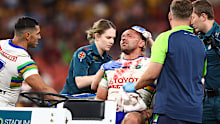 Jordan Rapana is helped from the field.