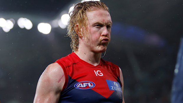 ADELAIDE, AUSTRALIA - APRIL 15: Clayton Oliver of the Demons leaves the field after a loss during the 2023 AFL Round 05 match between the Essendon Bombers and the Melbourne Demons at Adelaide Oval on April 15, 2023 in Adelaide, Australia. (Photo by Dylan Burns/AFL Photos)