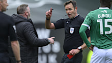 Plymouth Argyle manager Wayne Rooney was shown a red against Blackburn.