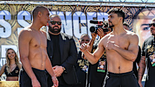 Joey Spencer (R) and Tim Tszyu) (L) face off during weigh in on April 05, 2025 in Newcastle, Australia. Tszyu and Spencer will meet in Sunday's IBO Inter-Continental Super Welterweight Title fight. (Photo by Roni Bintang/Getty Images)