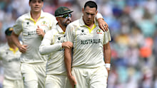 Nathan Lyon of Australia congratulates teammate Scott Boland during the WTC final.
