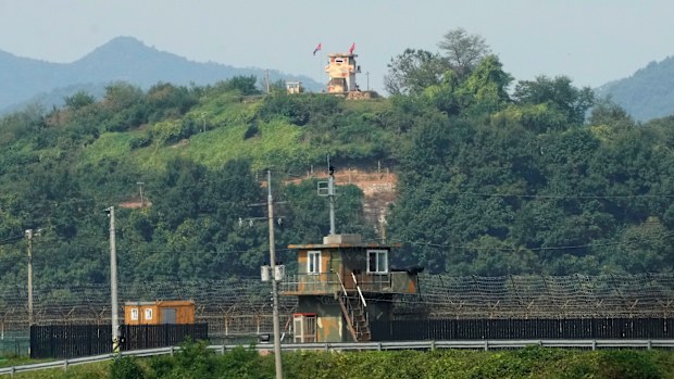 Military guard posts of North Korea, rear, and South Korea, bottom, are seen in Paju, near the border. 