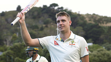 WELLINGTON, NEW ZEALAND - FEBRUARY 29: Cameron Green of Australia acknowledges the crowd as he leaves the field at the end of play during day one of the First Test in the series between New Zealand and Australia at Basin Reserve on February 29, 2024 in Wellington, New Zealand. (Photo by Hagen Hopkins/Getty Images)
