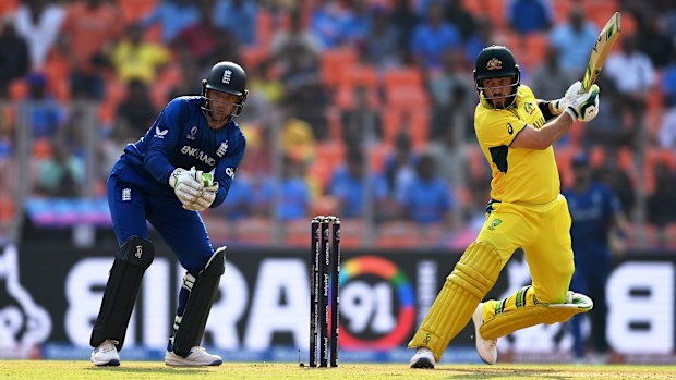 AHMEDABAD, INDIA - NOVEMBER 04: Josh Inglis of Australia plays a shot as Jos Buttler of England keeps during the ICC Men's Cricket World Cup India 2023 between England and Australia at Narendra Modi Stadium on November 04, 2023 in Ahmedabad, India. (Photo by Gareth Copley/Getty Images)