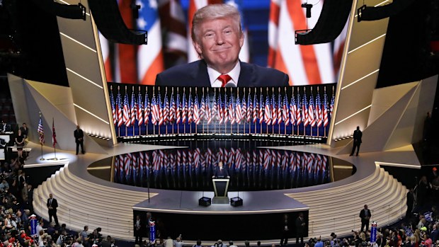 Republican presidential candidate Donald Trump smiles as he addresses delegates during the final day session of the Republican National Convention in Cleveland, in 2016.