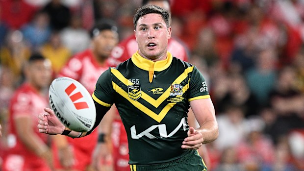 Mitchell Moses of Australia passes the ball.