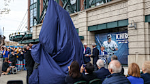 Ken Griffey Jr, Edgar Martinez and Ichiro Suzuki pull the tarp off during the unveiling.