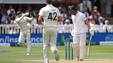 Jonny Bairstow wanders from his crease as Australia's Alex Carey throws the ball at his strumps, getting England's batter out.