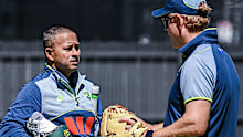 ADELAIDE, AUSTRALIA - DECEMBER 16: Usman Khawaja of Australia chats Andrew McDonald Head coach of Australia during an Australia nets session at Adelaide Oval on December 16, 2025 in Adelaide, Australia. (Photo by Mark Brake/Getty Images)