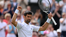 Novak Djokovic celebrates winning match point against Thanasi Kokkinakis.