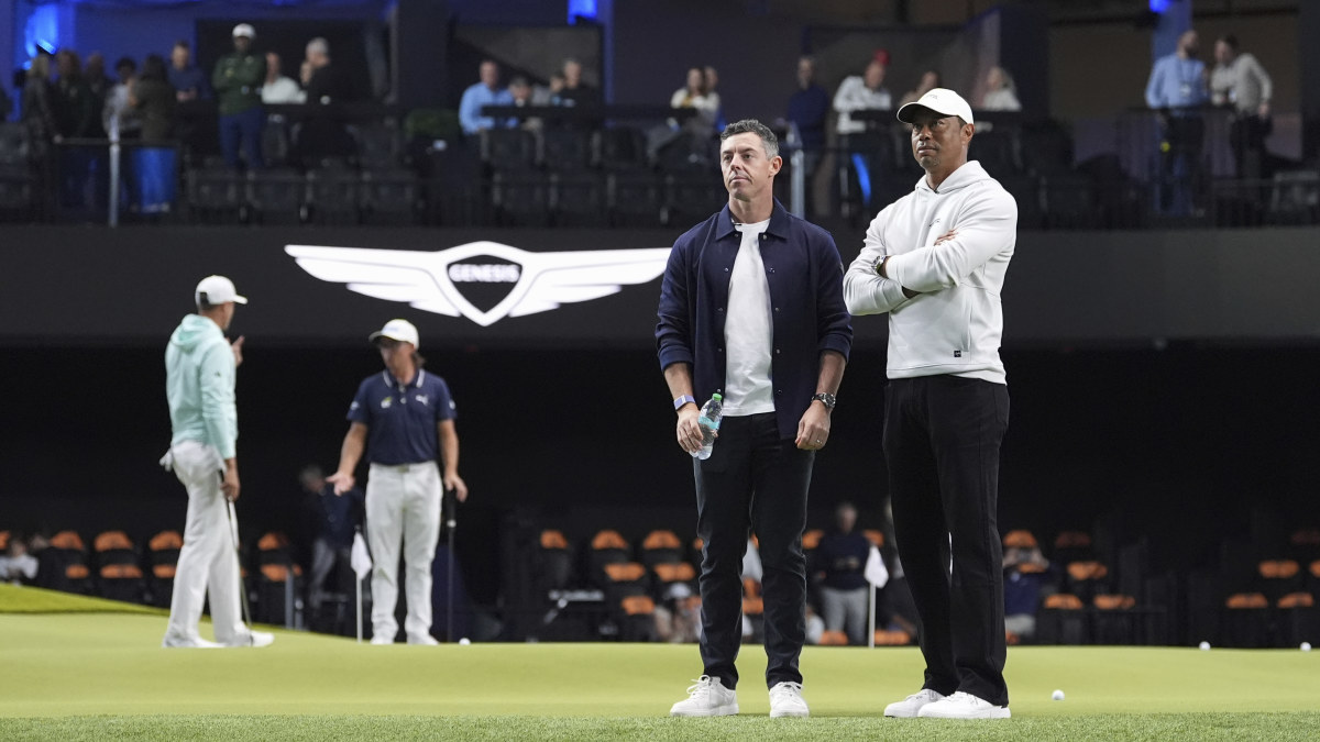 Golf news 2025 TGL debut results, explainer; Tiger Woods hits camera