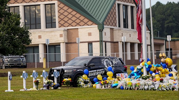 A memorial is seen at Apalachee High School after the school shooting.