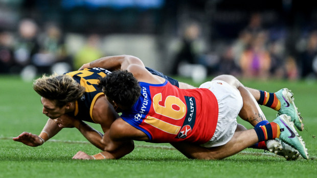 Rayner's tackle caused Worrell's wrist to get stuck awkwardly underneath the pair.