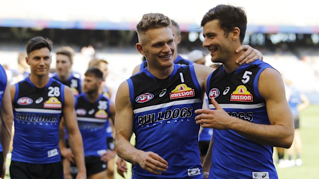 Adam Treloar and Josh Dunkley.
