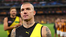 Dustin Martin walks from the ground following his 300th match.