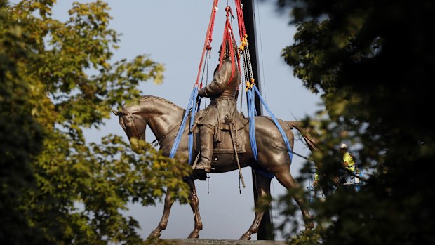 The statue of General Robert E. Lee, which towered over Richmond, Virginia, for generations was taken down. 