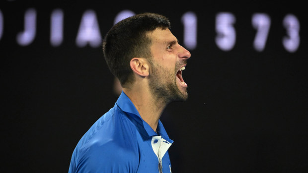 Novak Djokovic screams at the stands after winning his second round match against Alexei Popyrin.