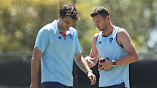Pat Cummins and Josh Hazlewood bowl during a practise session.