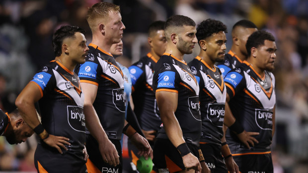 Wests Tigers players look on after a Dragons try during the round 14 NRL match between St George Illawarra Dragons and Wests Tigers at WIN Stadium on June 07, 2024, in Wollongong, Australia. (Photo by Jason McCawley/Getty Images)
