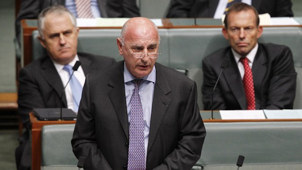 Malcolm Turnbull and Tony Abbott look on as Petro Georgiou delivers his final speech