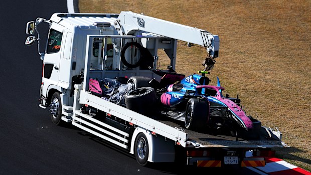 The damaged car of Jack Doohan of Australia driving the (7) Alpine F1 A525 Renault is returned on a truck after a crash during practice ahead of the F1 Grand Prix of Japan at Suzuka Circuit on April 04, 2025 in Suzuka, Japan. (Photo by Bryn Lennon - Formula 1/Formula 1 via Getty Images)