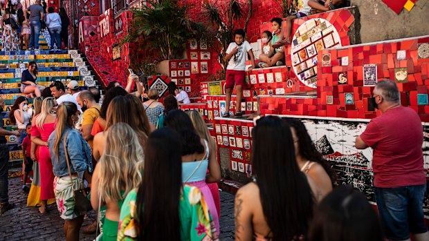 People line up to take their pictures on the Selaron Stairway in Rio de Janeiro, Brazil.