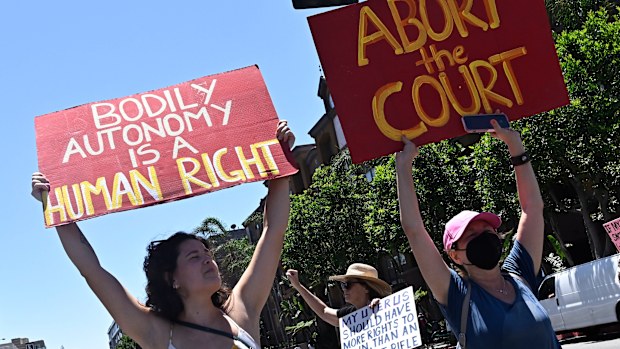 Activists march through downtown Los Angeles, Saturday, June 25, 2022, as they protest the Supreme Court's ruling on abortion. 