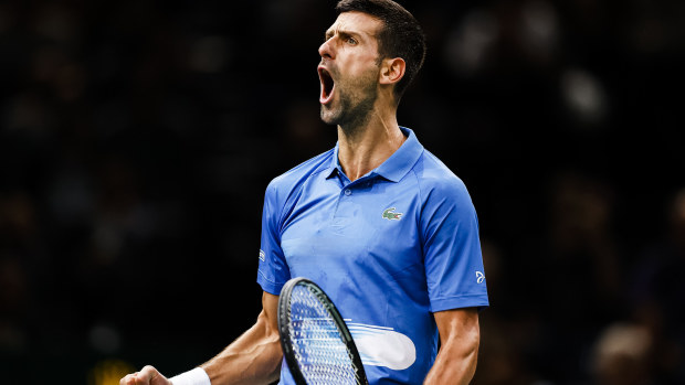 Novak Djokovic celebrates a set won against Lorenzo Musetti.
