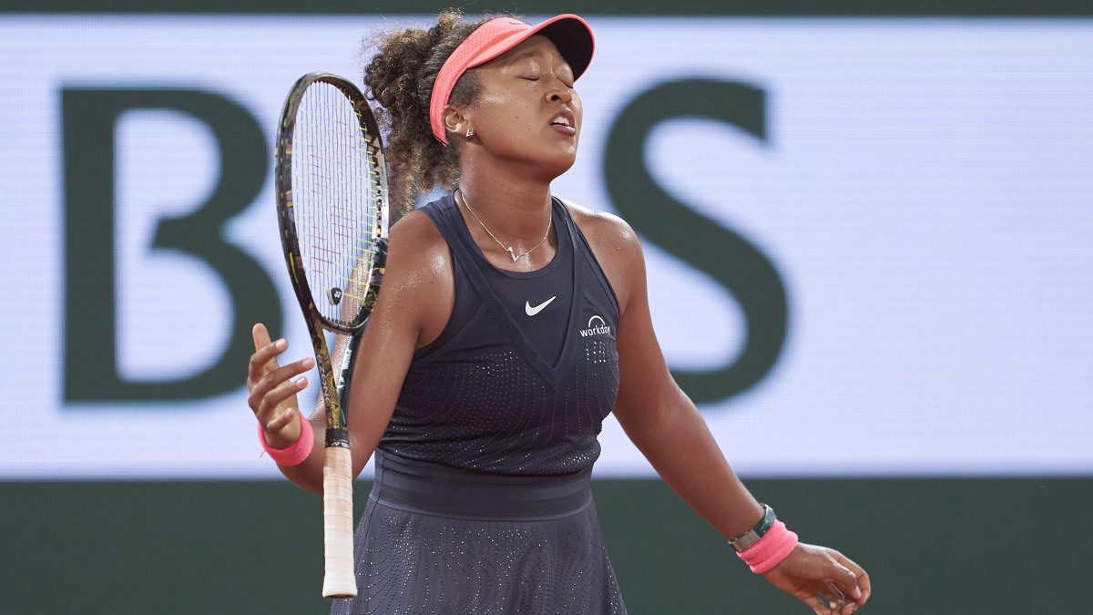 Osaka in tears as champ pulls off epic comeback