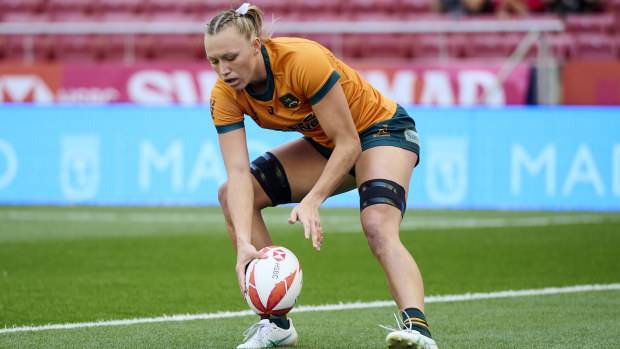 Maddison Levi #12 of Australia in action during HSBC Madrid Rugby Sevens match between Australia and Fiji at Civitas Metropolitano Stadium on June 01, 2024 in Madrid, Spain. (Photo by Borja B. Hojas/Getty Images)