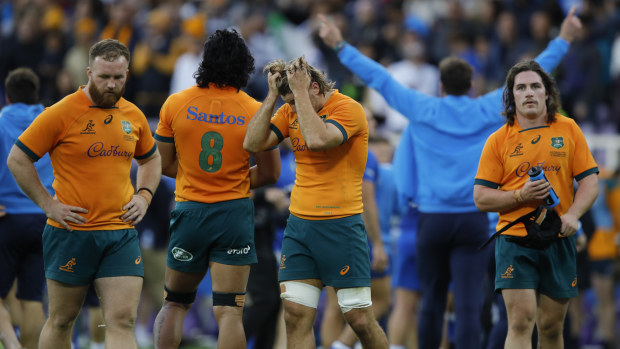 Australia react to the loss at Stadio Artemio Franchi.