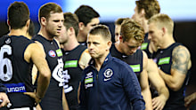 Brendon Bolton addresses Carlton players during the round nine AFL match between the North Melbourne Kangaroos and the Carlton Blues at Etihad Stadium on May 21, 2016 in Melbourne, Australia.