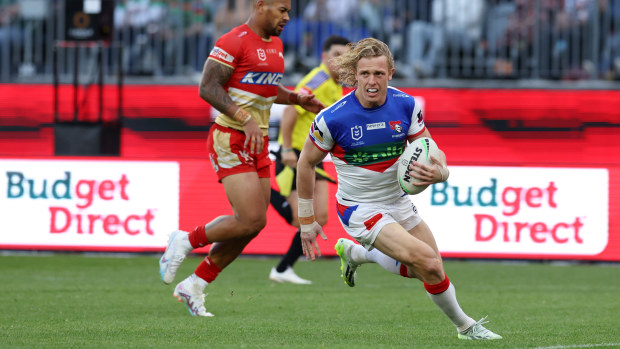 Phoenix Crossland of the Knights scores a try during the round 23 NRL match between Dolphins and Newcastle Knights at Optus Stadium on August 05, 2023 in Perth, Australia. (Photo by Will Russell/Getty Images)