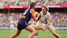 James Harmes of the Bulldogs tackles Luke Ryan of the Dockers.