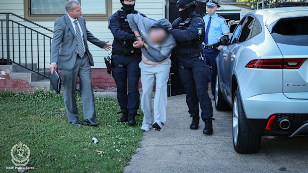 A 43-year-old man was arrested in Casula over his alleged role in the murder of John Versace.