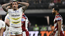 Warrington Wolves Paul Vaughan reacts during the Super League rugby league match between the Wigan Warriors and the Warrington Wolves at Allegiant Stadium in Las Vegas, Saturday, March 1, 2025. (AP Photo/David Becker)