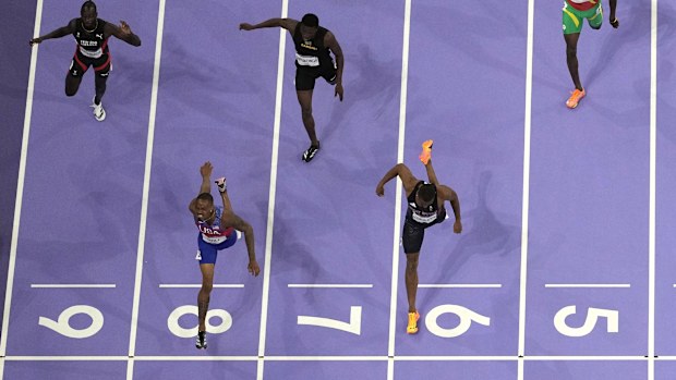 Quincy Hall, of the United States, lane eight, wins the men's 400-meter final.