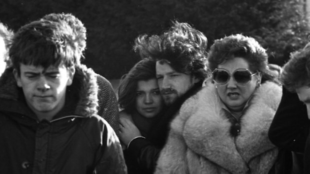 To left, U2 manager Paul McGuinness. Beside lady in fur coat are husband and wife Ali Hewson and Bono. 11/01/1986 (Part of the Independent Newspapers Ireland/NLI Collection). (Photo by Independent News And Media/Getty Images)