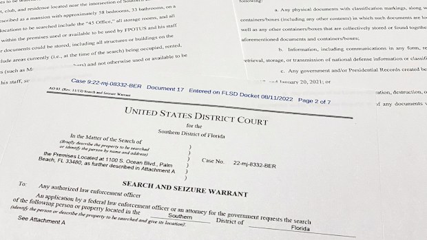 The FBI's unsealed search warrant for former President Donald Trump's Mar-a-Lago estate in Palm Beach, Fla., is photographed Friday, Aug. 12, 2022. (AP Photo/Jon Elswick)