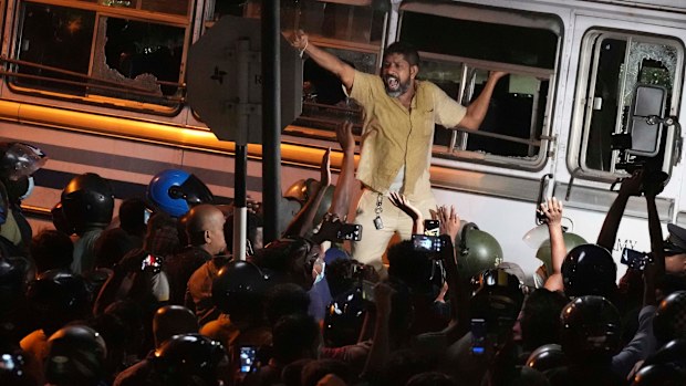 A Sri Lankan shouts anti government slogans during a protest outside Sri Lanka's President's private residence on the outskirts of Colombo. 