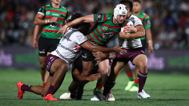 Tallis Duncan of the Rabbitohs is tackled during the South Sydney Rabbitohs and the Manly Sea Eagles at Industree Group Stadium on February 10, 2023 in Gosford, Australia. (Photo by Jason McCawley/Getty Images)