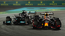 Max Verstappen of the Netherlands driving the (33) Red Bull Racing RB16B Honda leads Lewis Hamilton of Great Britain driving the (44) Mercedes AMG Petronas F1 Team Mercedes W12 during the F1 Grand Prix of Abu Dhabi at Yas Marina Circuit on December 12, 2021 in Abu Dhabi, United Arab Emirates. (Photo by Joe Portlock - Formula 1/Formula 1 via Getty Images)
