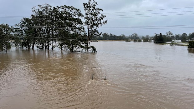 Flooding is seen next to the Pacific Highway in Bulahdelah, NSW.