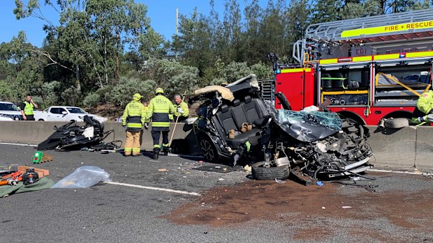 A man in his 40s has been rushed to hospital after a four-car crash on Sydney's M4 at Eastern Creek.