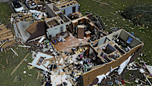 A home is destroyed after a severe storm passed the area on Saturday, May 17, 2025 in London, Ky. (AP Photo/Carolyn Kaster)